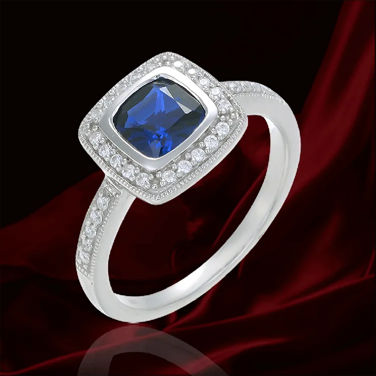 Glistening Cushion Cut Sapphire Ring