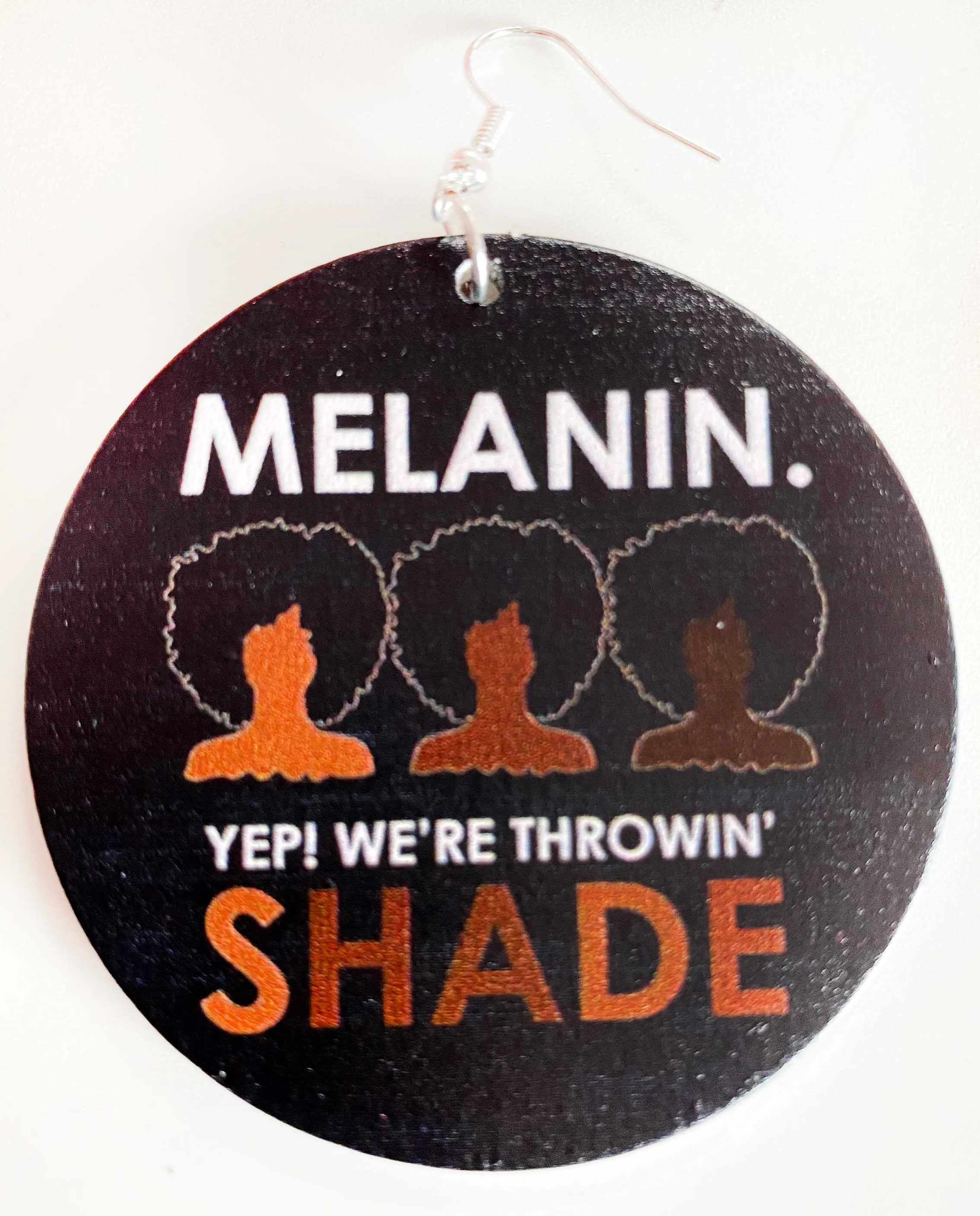 Melanin.  Yep we're throwin shade earrings